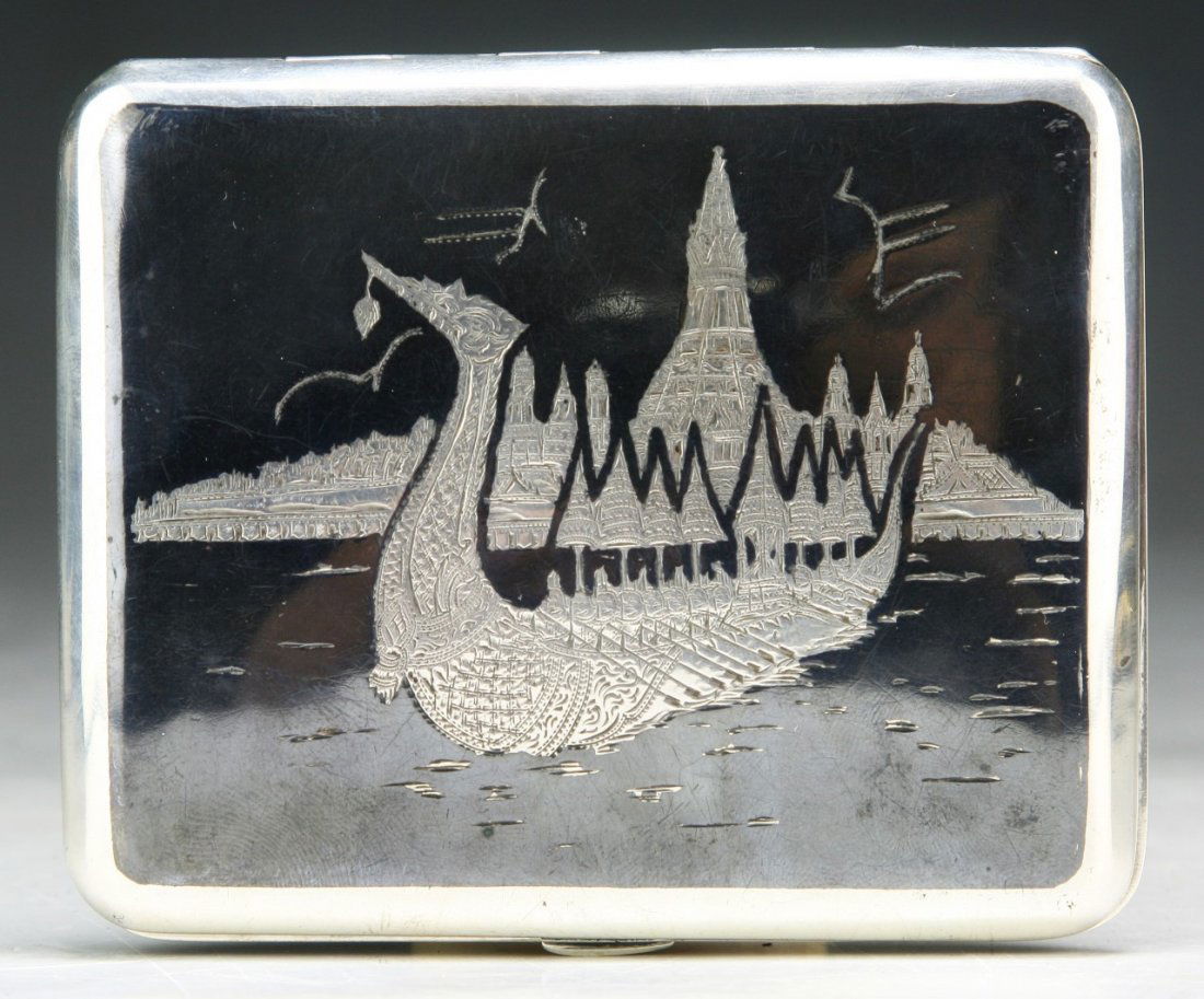 A Japanese Antique Silver Engraved Damascene Cigarette (1 of 4)