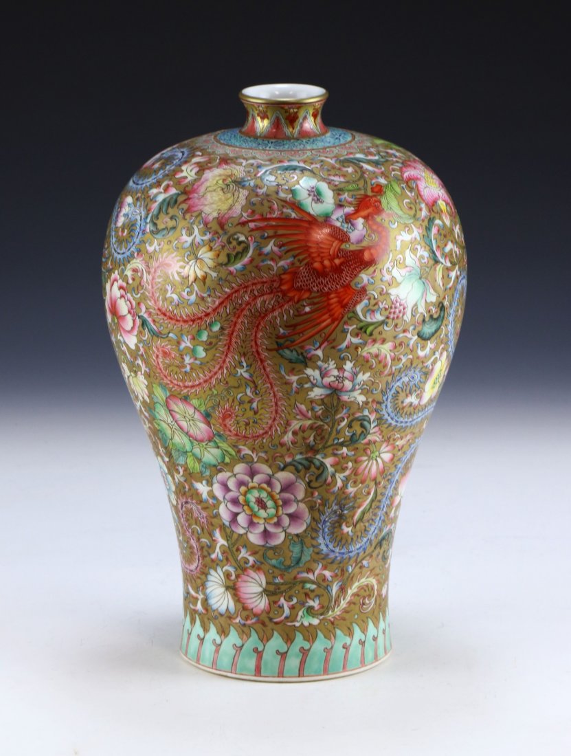 A CHINESE ANTIQUE GILT FAMILLE ROSE MEIPING VASE: A Chinese Antique Gilt Famille Rose Meiping Vase: Of Baluster Form With High Shoulder, Body Finely Painted With A Swirling Phoenix Amid Blooming Flowers And Continuous Vines, All On An Evenly Glazed G