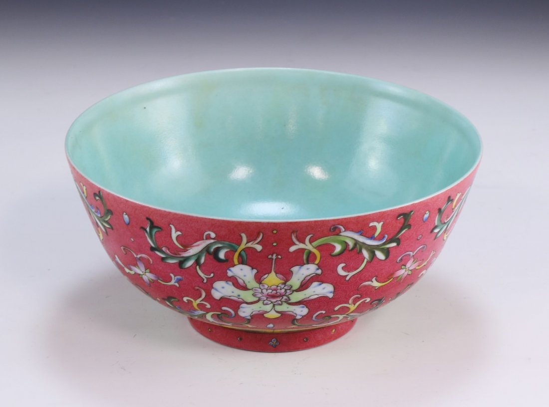 A FINE AND RARE CORAL-GROUND FAMILLE ROSE FLORAL BOWL (1 of 6)