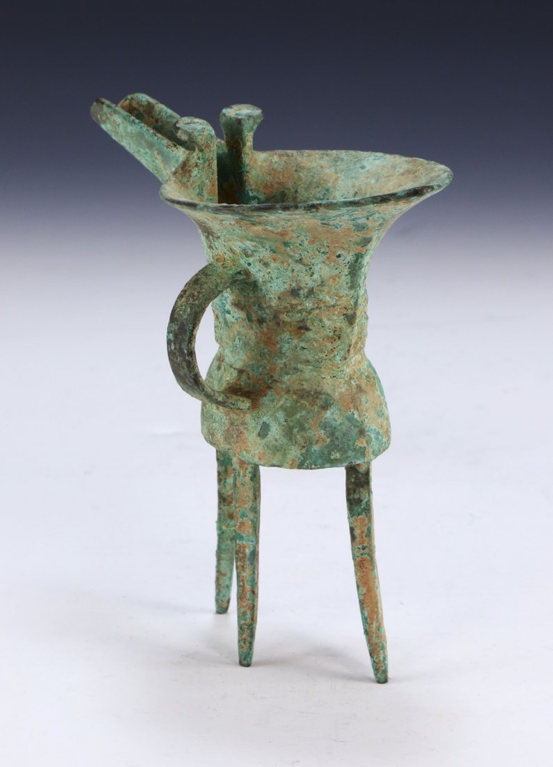 A CHINESE ARCHAISTIC BRONZE JUE CUP (1 of 5)