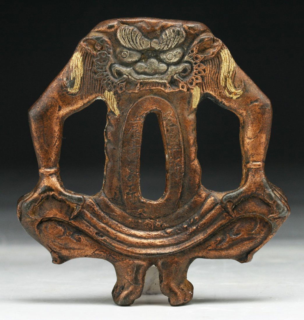 A JAPANESE ANTIQUE BRONZE TSUBA: A Japanese Antique Bronze Tsuba; Size: H: 3" (7.62cm)