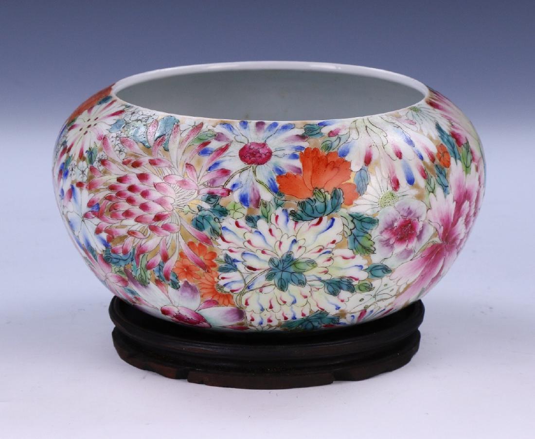 A CHINESE ANTIQUE FAMILLE ROSE PORCELAIN WASHER: A Chinese Antique Famille Rose Porcelain Washer: Signed 'Qianlong' in Iron Red On The Base, Presented On A Wood Stand; Size: D: 7-1/2" (19.05cm)