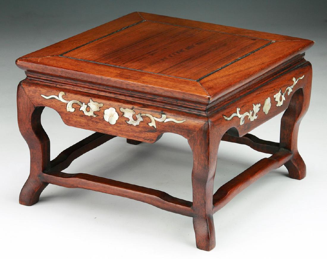 A CHINESE ANTIQUE MOTHER OF PEARL INLAID WOOD STAND: A Chinese Antique Mother Of Pearl inlaid Wood Stand; Size: L: 8" (20.32cm)