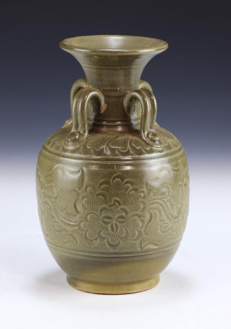 A CHINESE ANTIQUE CELADON GLAZED PORCELAIN VASE: A Chinese Antique Celadon Glazed Porcelain Vase: Of Ovoid Form, Cylindrical Neck Flanked By Four Small Curling Handles, Rising To An Outwardly Flared Rim, Body Finely Painted With Blooming Flower Figu