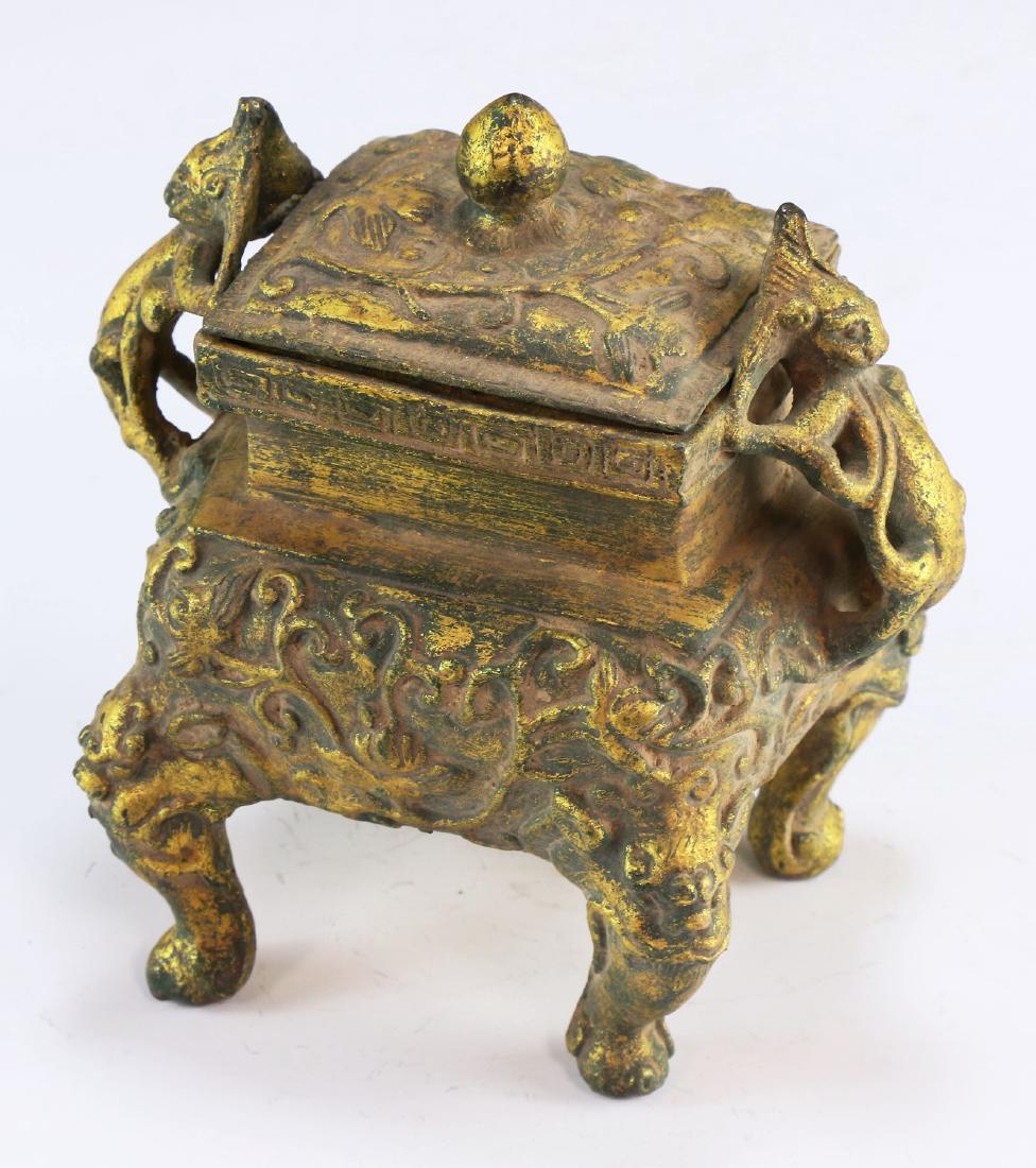 A CHINESE GILT BRONZE CENSER WITH COVER (1 of 7)