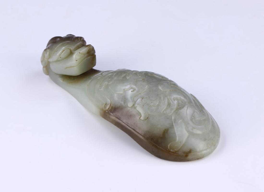 A CHINESE ANTIQUE ARCHAIC JADE BUCKLE (1 of 3)