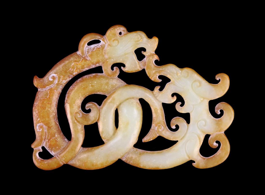 A CHINESE ARCHAIC JADE CARVED DRAGON GROUP (1 of 2)
