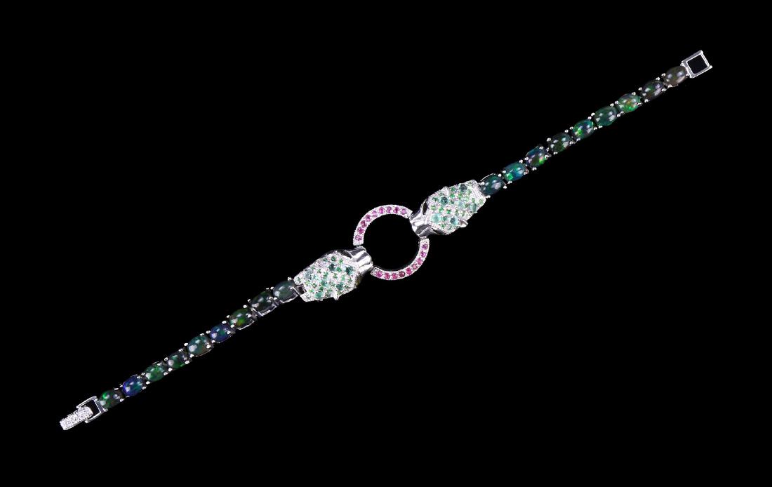 AN OPAL, TOURMALINE, EMERARLD & RUBY BRACELET (1 of 5)