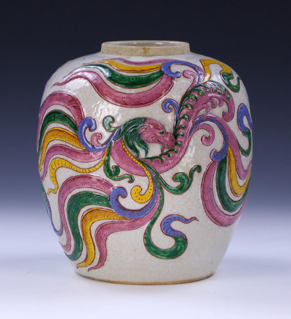 A CHINESE ANTIQUE EMBOSSED FAMILLE ROSE PORCELAIN JAR (1 of 5)