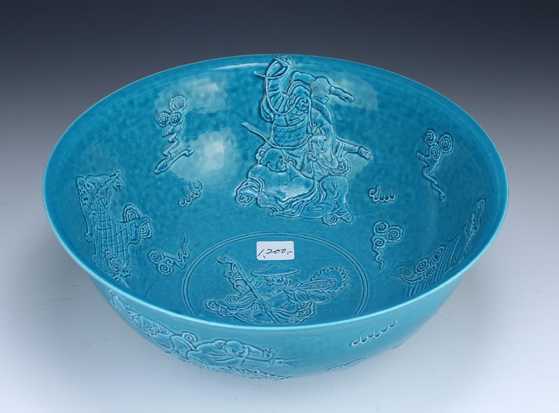 A CHINESE ANTIQUE BLUE GLAZED PORCELAIN BOWL: A Chinese Antique Blue Glazed Porcelain Bowl: Well Potted And Of Rising Sides, Finely Painted With Celestial Figures Around The Body Amid A Vibrant Turquoise Glaze, Six Character Qianlong Mark On The
