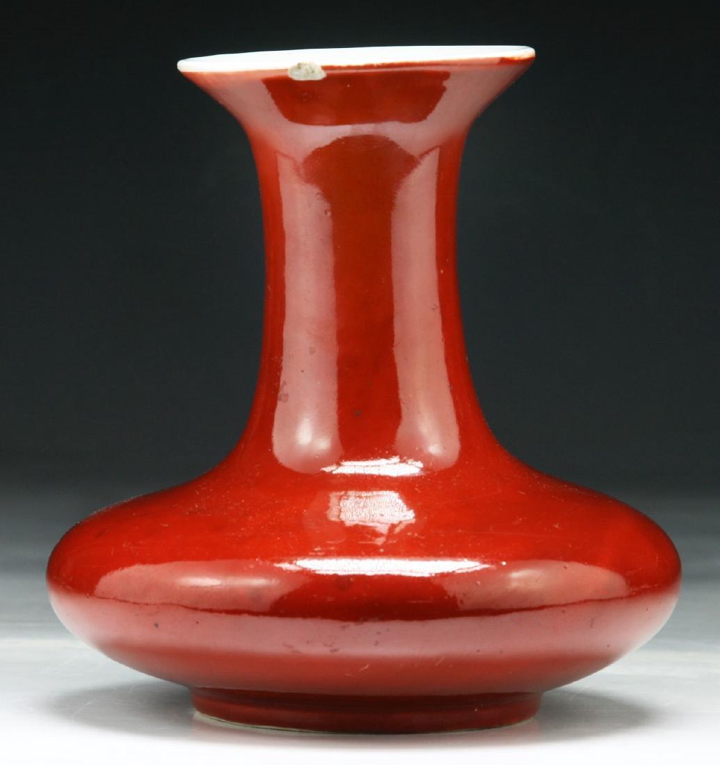 A CHINESE ANTIQUE RED GLAZED PORCELAIN VASE (1 of 5)