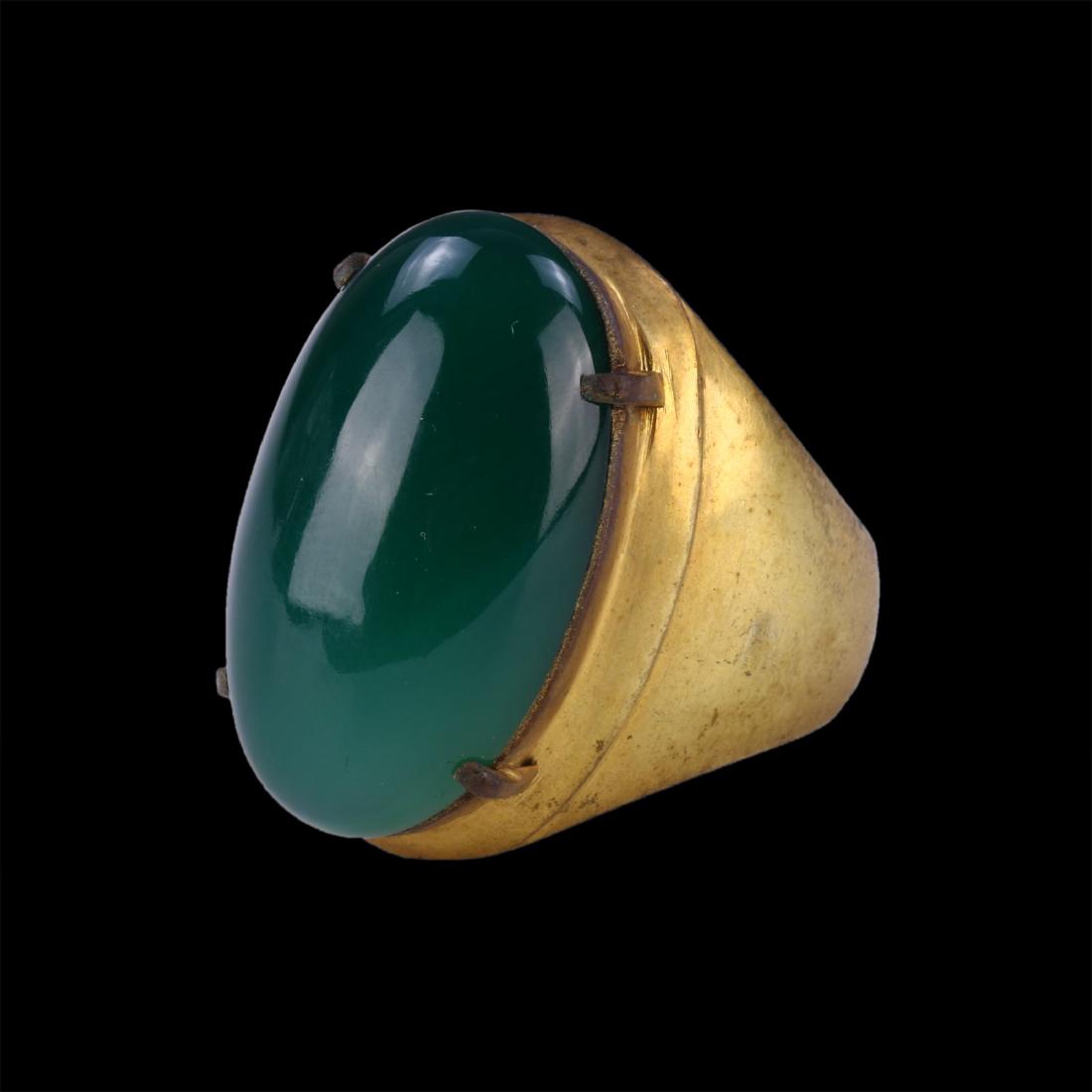 A GREEN JADEITE RING (1 of 3)