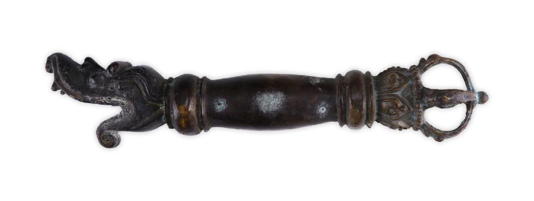 A TIBETAN ANTIQUE BRONZE RITUAL ITEM (1 of 4)