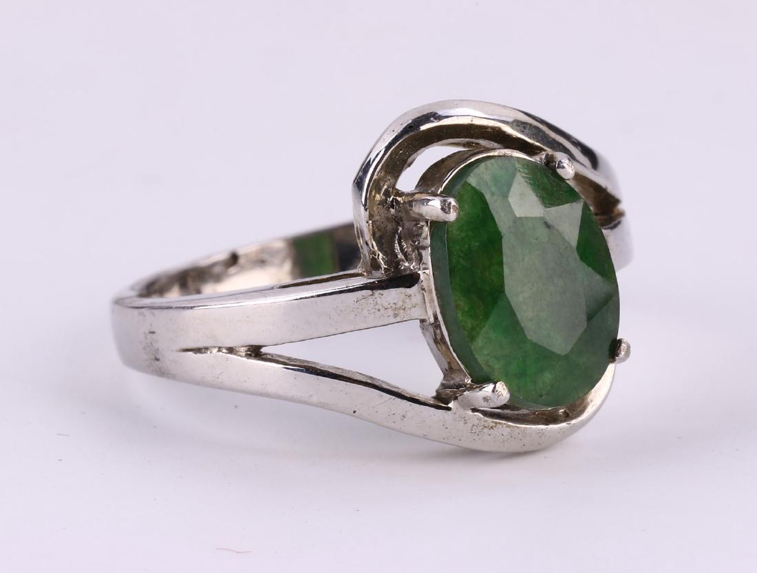 A DARK GREEN JADEITE RING (1 of 3)