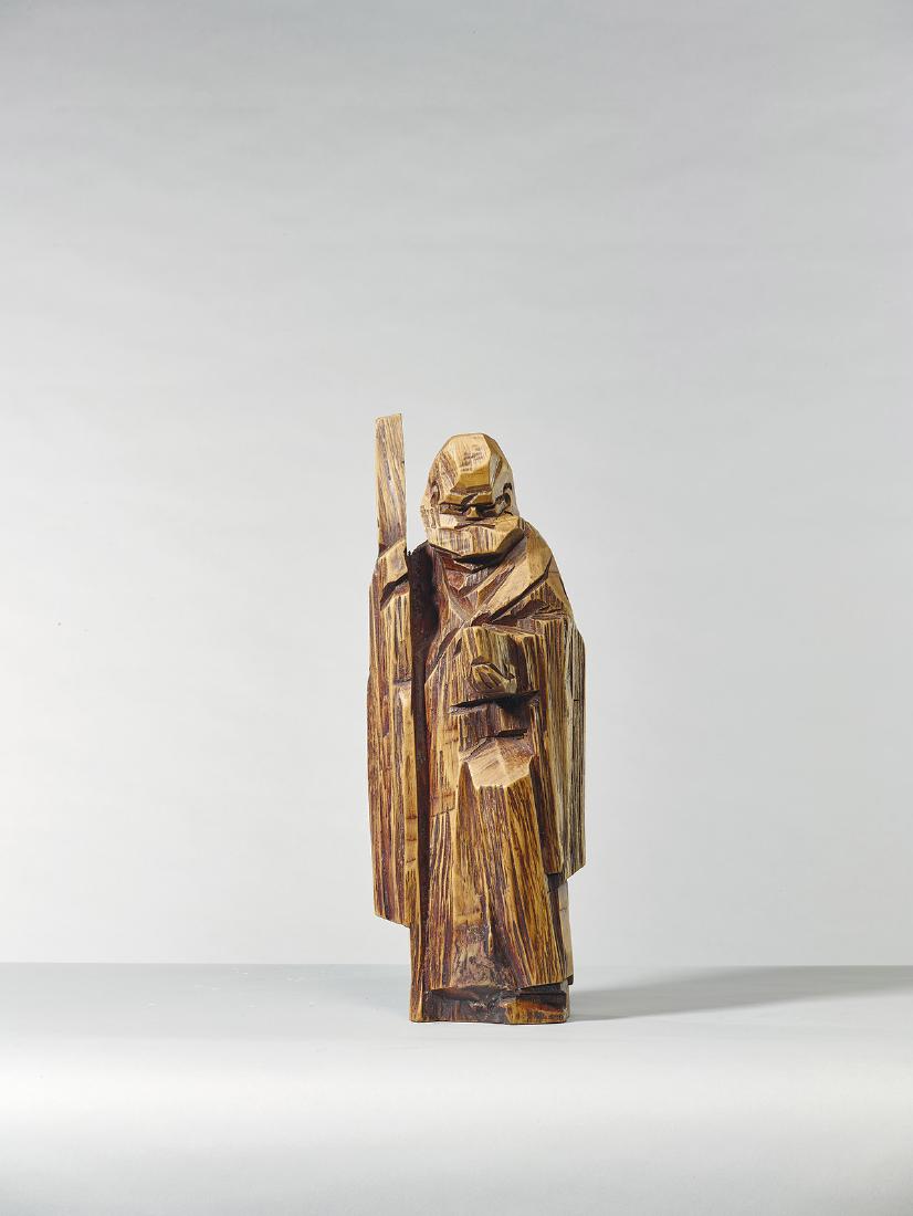 JU Ming (Taiwanese, b. 1938): DharmaWooden sculpture17(L) x 9.5(W) x 43.5(H) cmEngraved on the bottom JU Ming in ChineseThis sculpture is to be sold with a certificate of authenticity issued by Caves Gallery, Taipei.