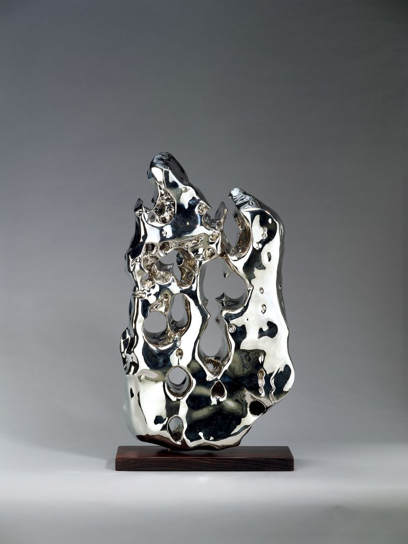 ZHAN Wang (Chinese, b. 1962): Artificial Rock No. 612003Stainless steel, edition no. 1/851(L) x 15(W) x 84(H) cmEngraved on the bottom Zhan Wang in Chinese, numbered 61, edition number 1/8, and dated 2003This sculpture is to be so