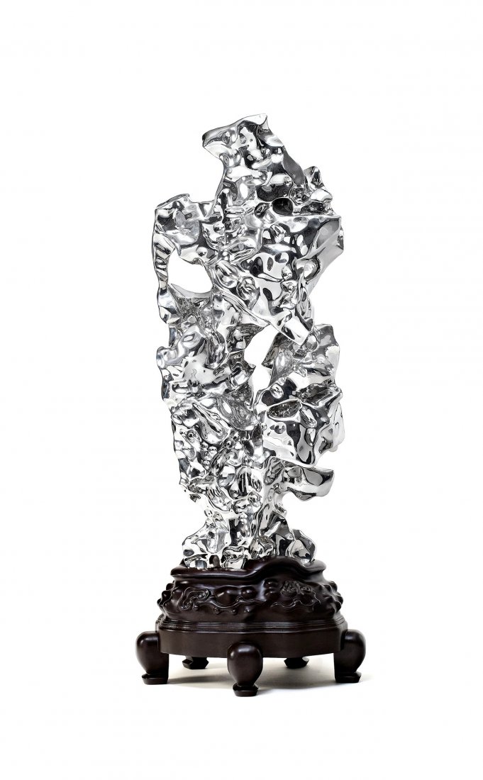 ZHAN Wang: Artificial Rock No. 762006Stainless steel and wood, edition no. 3/449(L) x 38(W) x 131(H) cm (with wood base)Engraved on the bottom Zhan Wang in Chinese, numbered 76, edition number 3/4, dated 2006