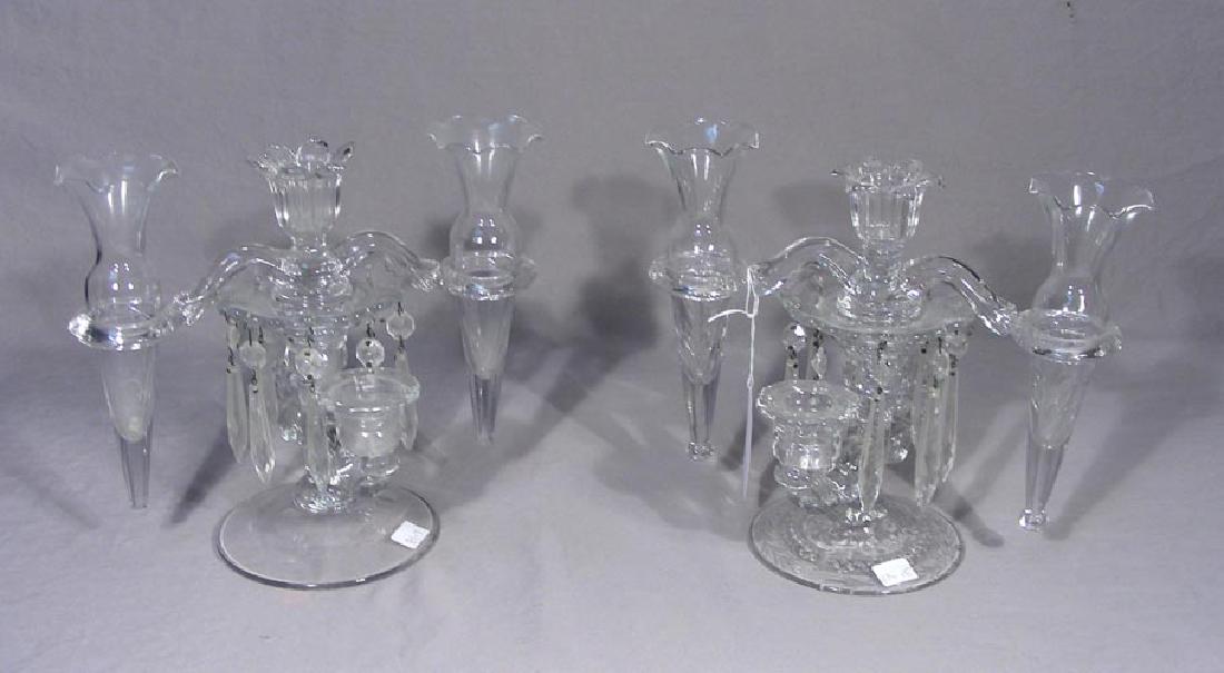 PAIR VINTAGE CRYSTAL CANDELABRA: Each with hanging pristms and side epergnes. 9" high, 11" wide. Note: One small chip on fluted epergne.