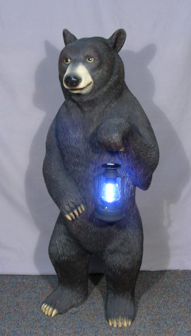 HUMOROUS COMPOSITION SCULPTURE OF BEAR HOLDING LANTERN (1 of 2)