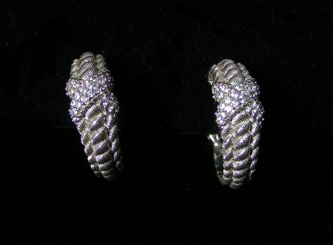 DESIGNER JUDITH RIPKA STERLING SILVER & CZ EARRINGS: Rib design with criss cross section set with cz.