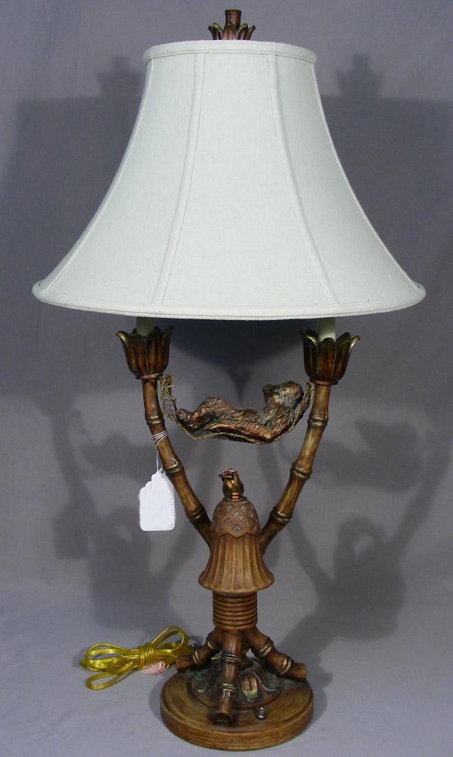 HEAVY HAND PAINTED COMPOSITION MONKEY MOTIF TABLE LAMP: Monkey sleeps in a hammock. Three lights. 35" high. Possibly Maitland-Smith.