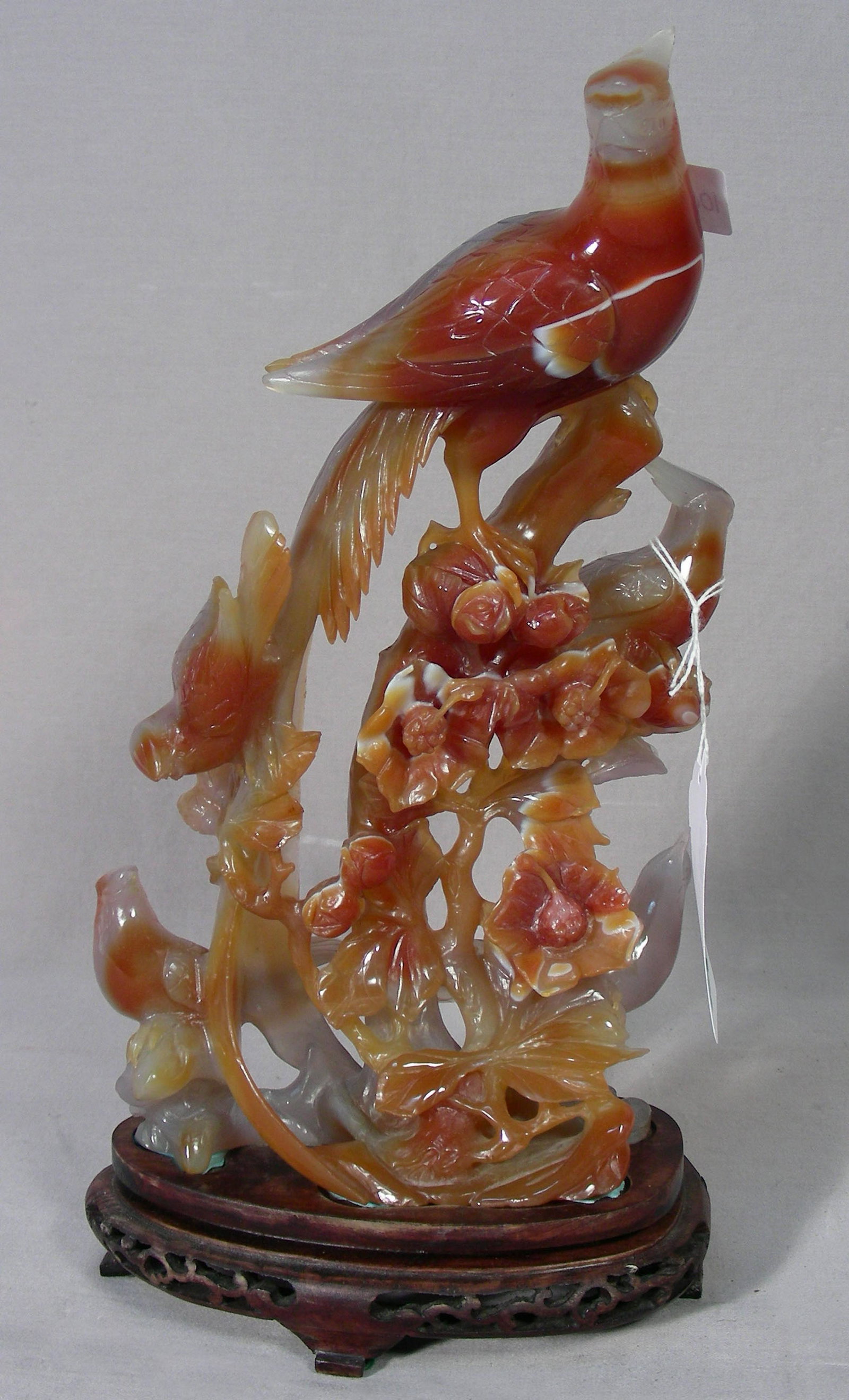CHINESE CARNELIAN CARVED SCULPTURE OF PHONIX BIRDS: Excellent detail. Note: beek on one bird has been broken. Overall on stand 12" high.