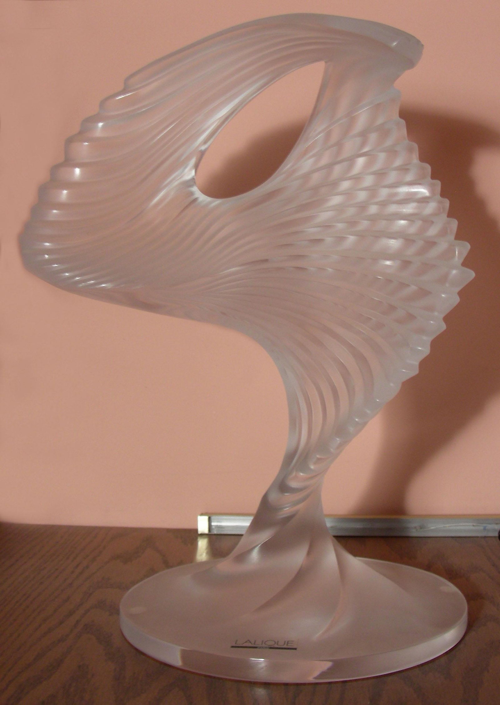 FRENCH LALIQUE CRYSTAL SCULPTURE "MOYEN MODELE TROPHY": Signed. 12 1/2" high.