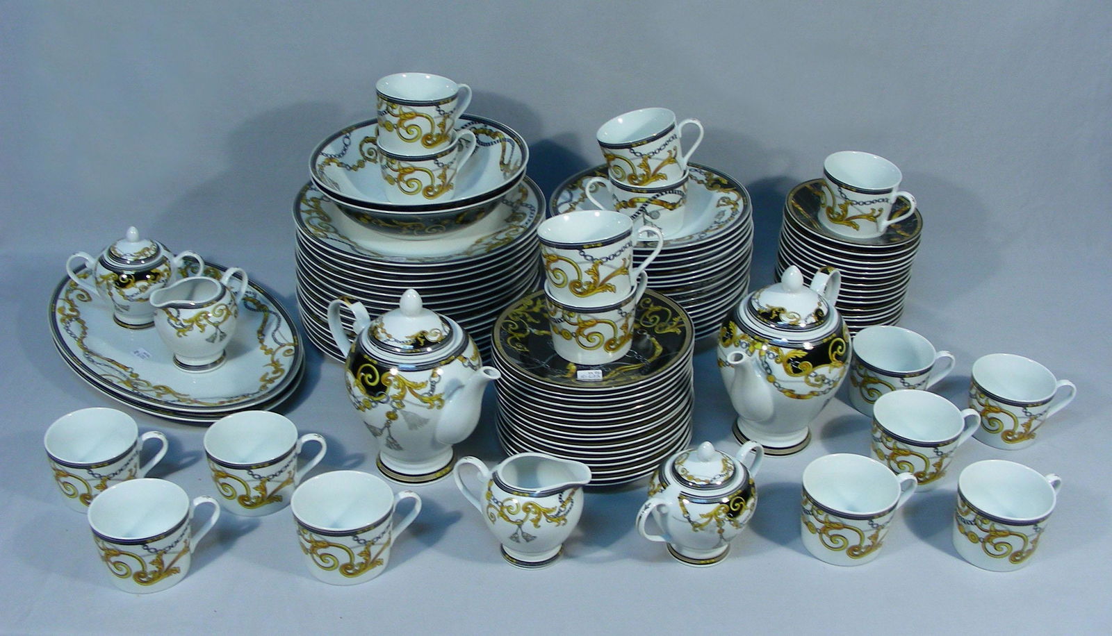106 PIECE SET OF VERSACE STYLE CHINA: Service for 16 with many extra serving pieces and espresso set.