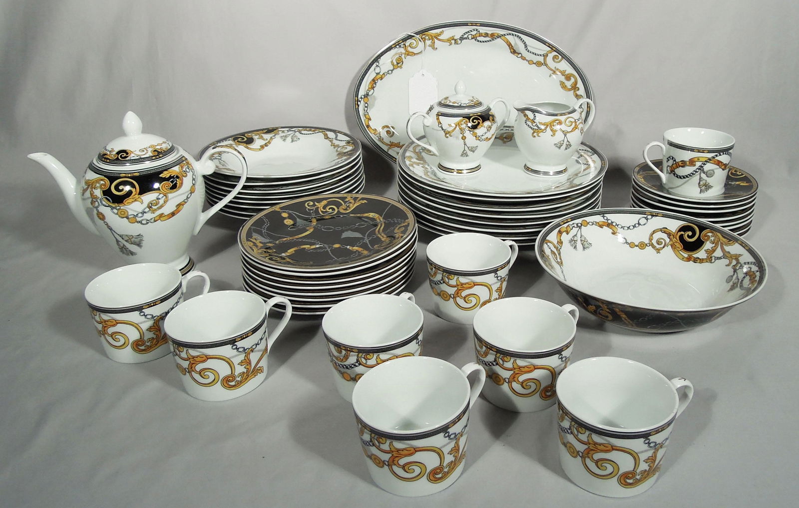 47 PIECE SET OF VERSACE STYLE DISHES: Service for eight with extras. Perfect condition.