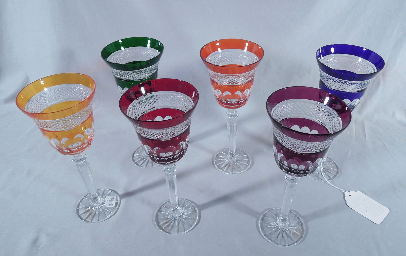 SET OF SIX MULTI COLORED GEMSTONE WINE GLASSES: Diamond pattern. Excellent condition.