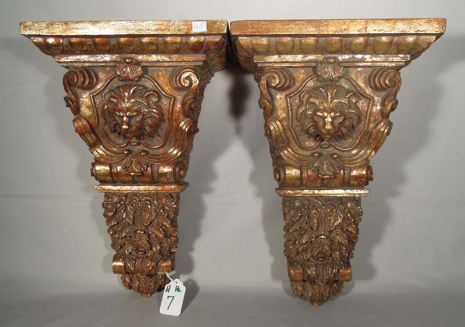 PAIR OF COMPOSITION GILT WALL SHELVES: 20 1/2" High, 13 1/4" Wide, 7 3/4" Deep.