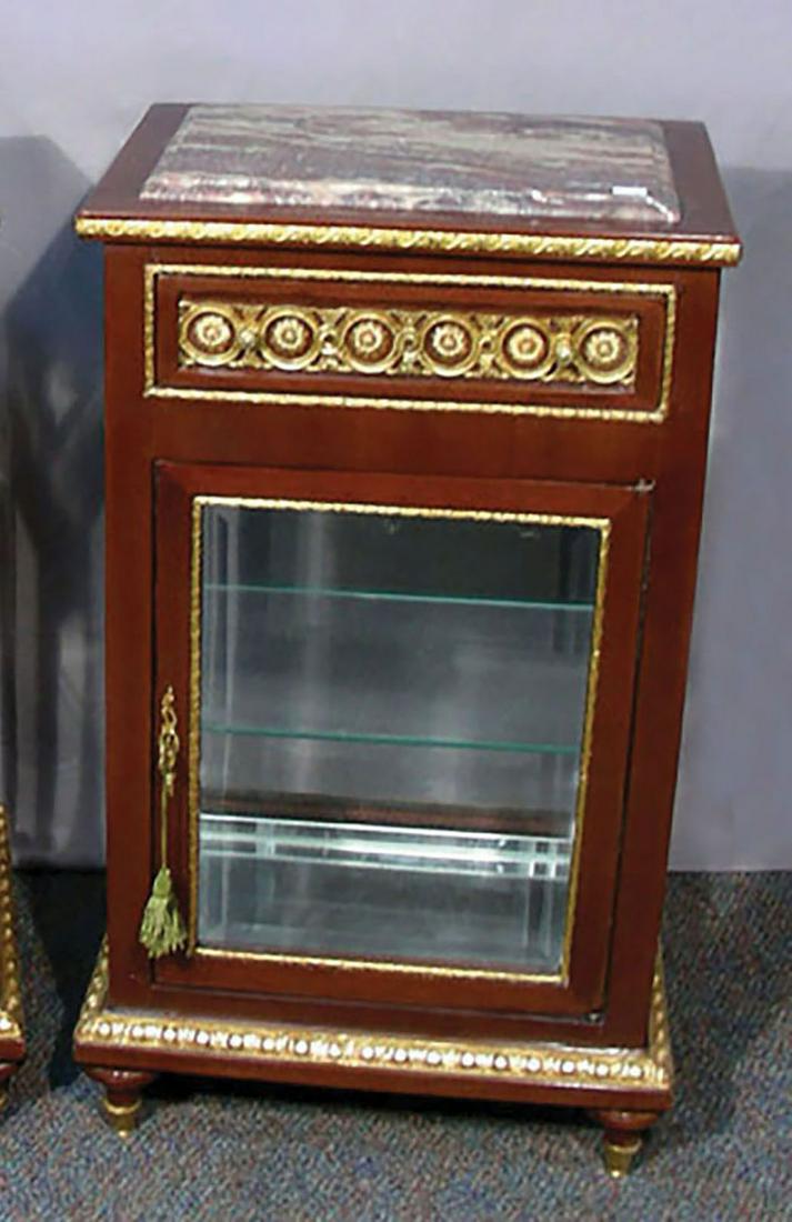 WOOD, GILT METAL VITRINE WITH MARBLE TOP: Ornate ormolu appointments. Beveled glass front door. Maroon & beige marble top. 30" high, 17" wide, 14" deep.