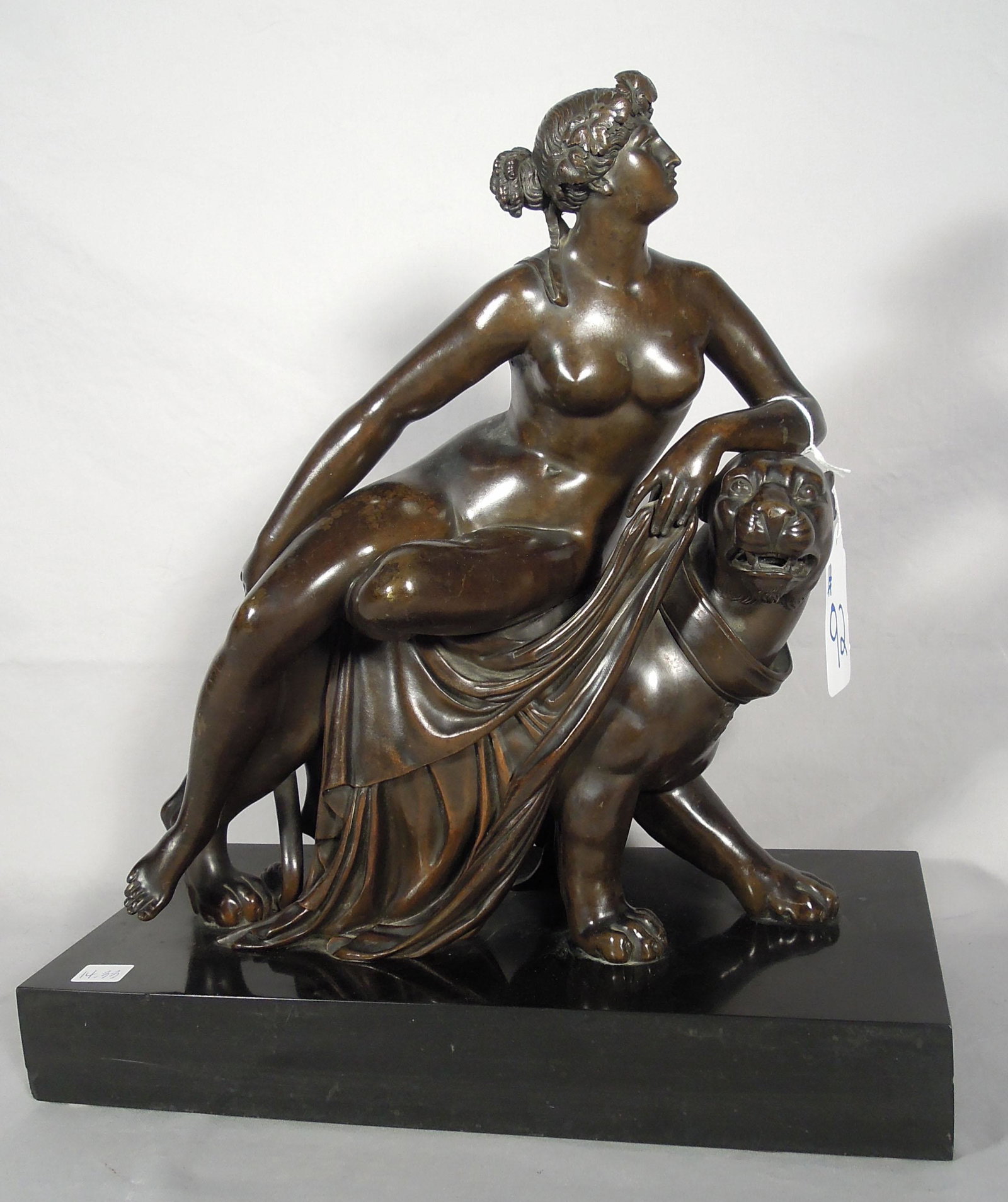 HEAVY BRONZE SCULPTURE OF WOMAN SEATED ON PANTHER: Excellent aged patina. Heavy marble base. 16" high, 15" wide, 7" deep.