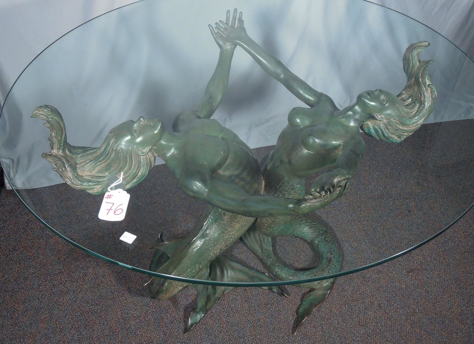FABULOUS VINTAGE NUDE MERMAID & MERMAN BRONZE TABLE: Very heavy bronze base with mermaid and merman with outstretched arms hold a round glass table top. Great aged green patina. 31" high, 44" dia.