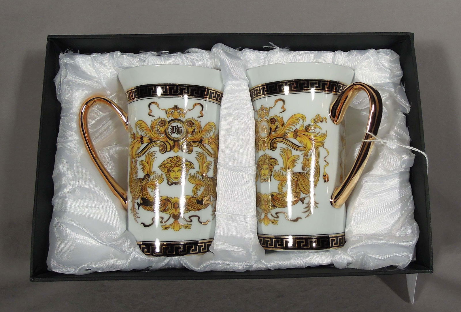 PAIR VERSACE STYLE COFFEE MUGS: Excellent condition. Original fitted box. Each glass 5" high.