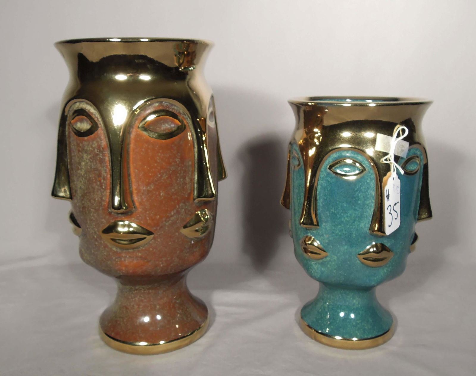 TWO PORCELAIN VASES WITH FACE MOTIF DESIGN (1 of 1)