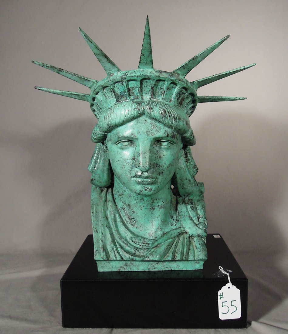 BRONZE SCULPTURE "STATUE OF LIBERTY" HEAD: Green patina. Heavy black marble base. 21 1/2" high, 17" wide.