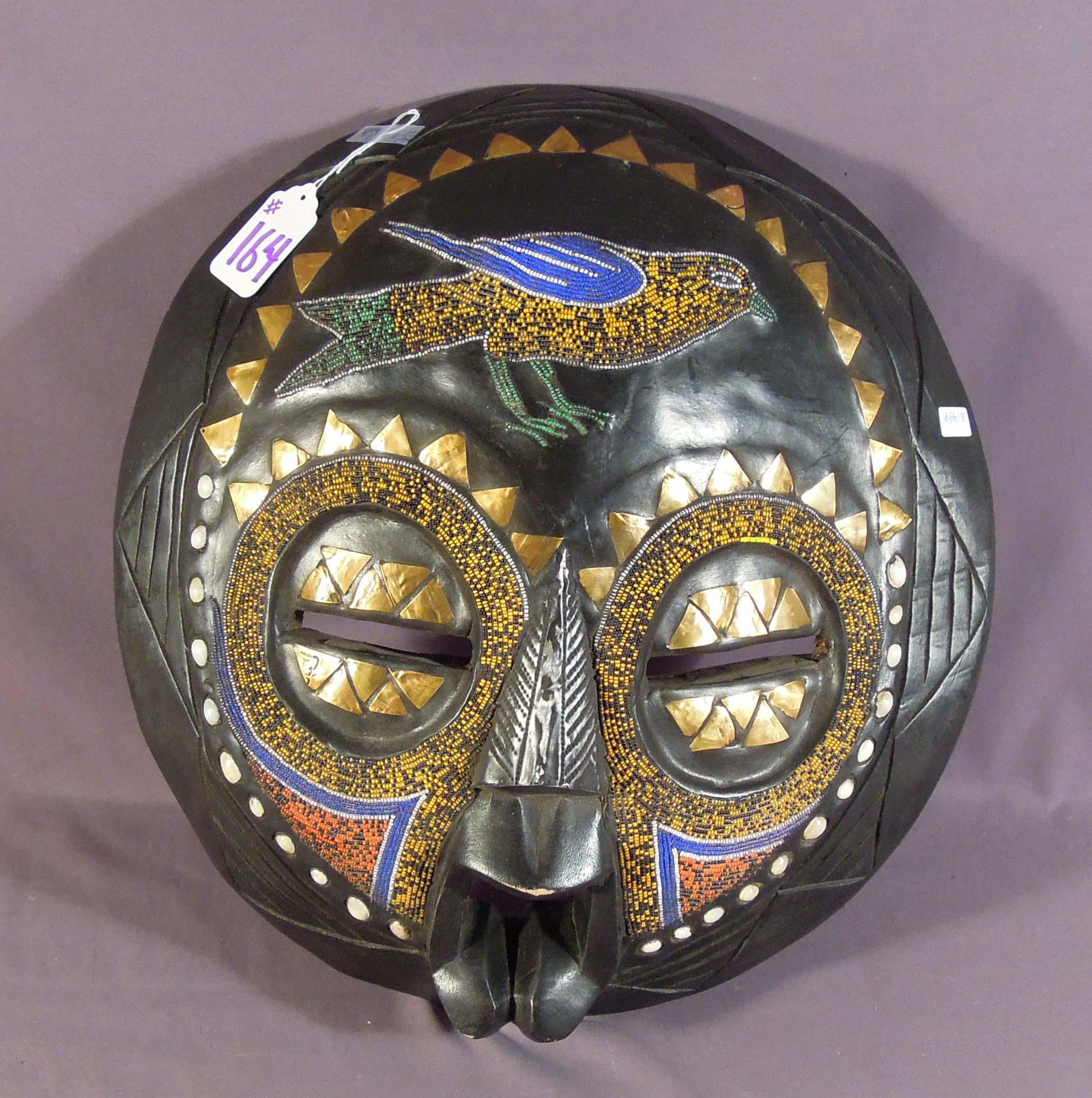 HEAVY HAND CARVED WOODEN BEADED MASK (1 of 2)