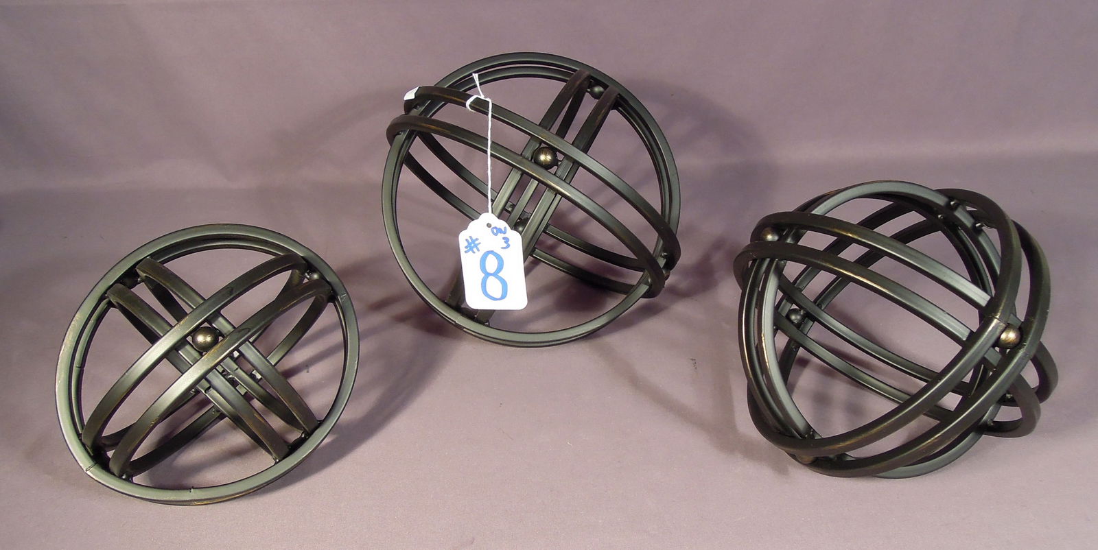 GROUP OF THREE GRADUATED METAL ARCHITECHTUAL TABLE TOP SPHERES (1 of 1)