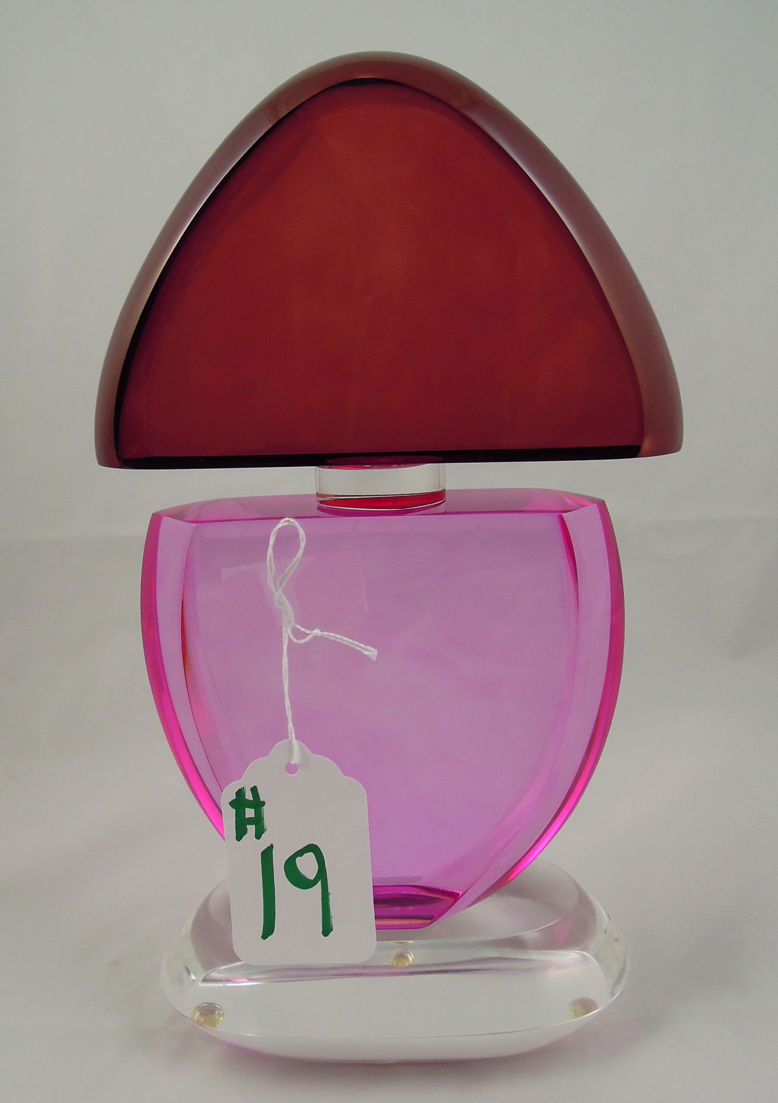 SIGNED VAN TEAL MID-CENTURY MODERN LUCITE DEMONSTRATION PERFUME BOTTLE: Amethyst & clear coloration. 11 3/4" high, 6" wide.