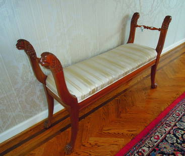 HENREDON HAND CARVED MAHOGANY & UPHOLSTERED BENCH: Animal head handles and claw feet. Striped upholstery. 32" high, 53" wide.