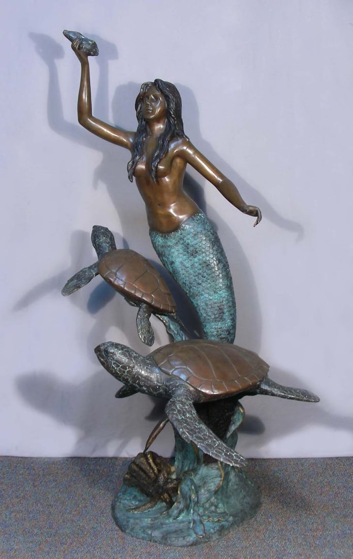 LIFE SIZE BRONZE SCULPTURE/FOUNTAIN OF MERMAID WITH SEA TURTLES: Mermaid holds a shell while two large sea turtles swim beside her. Excellent detail. Water emerges from turtle's mouths and shell in mermaids hand when used as a fountain. 65 1/2" high.