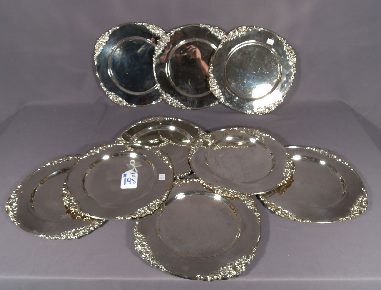 GROUP OF 12 ORNATE SILVER PLATED CHARGERS (1 of 1)