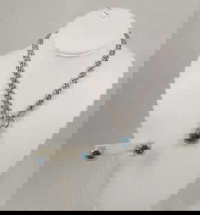 DESIGNER DAVID YURMAN STERLING SILVER, 18K, BLUE TOPAZ & DIAMOND 3 PIECE SET: set consists of: A 16" double strand sterling necklace with diamonds, a pair of sterling silver & 18k gold, blue topaz & diamond earrings with matching pendant. Excellent condition. All pieces