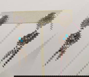 PAIR VINTAGE NATIVE AMERICAN STERLING SILVER & TURQUOISE EARRINGS: Sterling silver dangle earrings. 2 1/4" long.