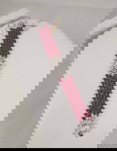 LADIES 14K W.G., BURMESE RUBY & DIAMOND ART DECO STYLE BRACELET: A wide bracelet set with five rows of very fine Burmese rubies totaling approx. 33.86 cts. Bracelet completed with full cut round and baguette diamonds totaling 2.45 cts. 7" long.