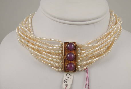 BEAUTIFUL VINTAGE LADIES 14K Y.G. TEN STRAND PEARL & RUBY NECKLACE: Ten strands of 3mm cultered pearls with a large rectangular 14k yellow gold clasp with three cabochon rubies. 15" long.