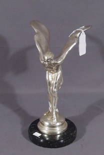 BRONZE SCULPTURE "SPIRIT OF ECSTACY" (ROLLS ROYCE GIRL): Fine detail. Silver patina. Black marble base. 13" high, 7 1/2" wide.