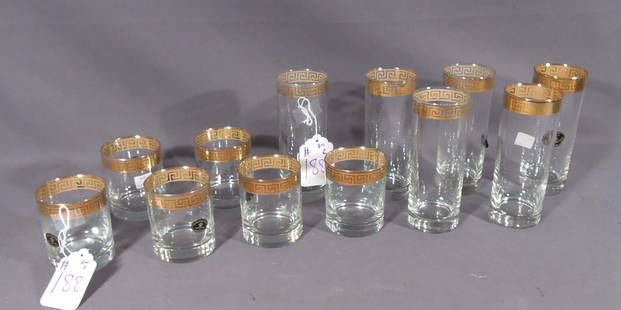 TWO SETS OF SIX GLASSES: Boxed set of six water glasses and boxed set of tumblers. Each with gold Greek Key design.
