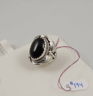 LADIES VINTAGE NATIVE AMERICAN STERLING SILVER & ONYX RING: Marked sterling and initialed R.B. inside ring.